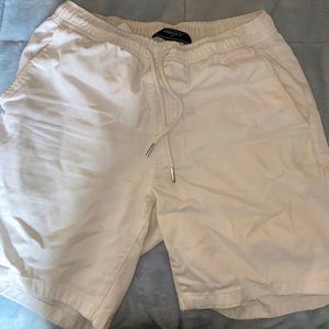 white mean shorts